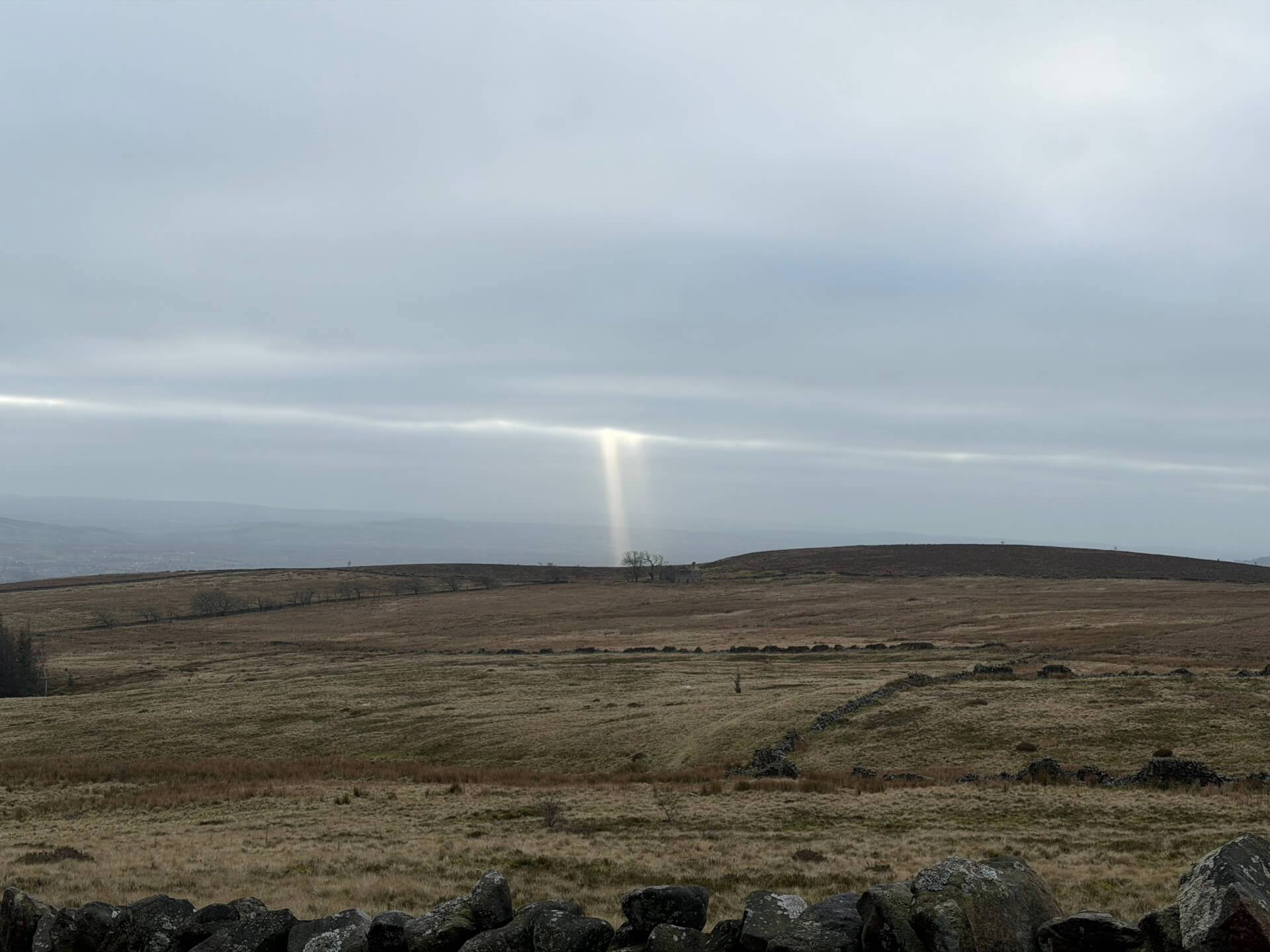 View of some sunbeams from Easington Fell